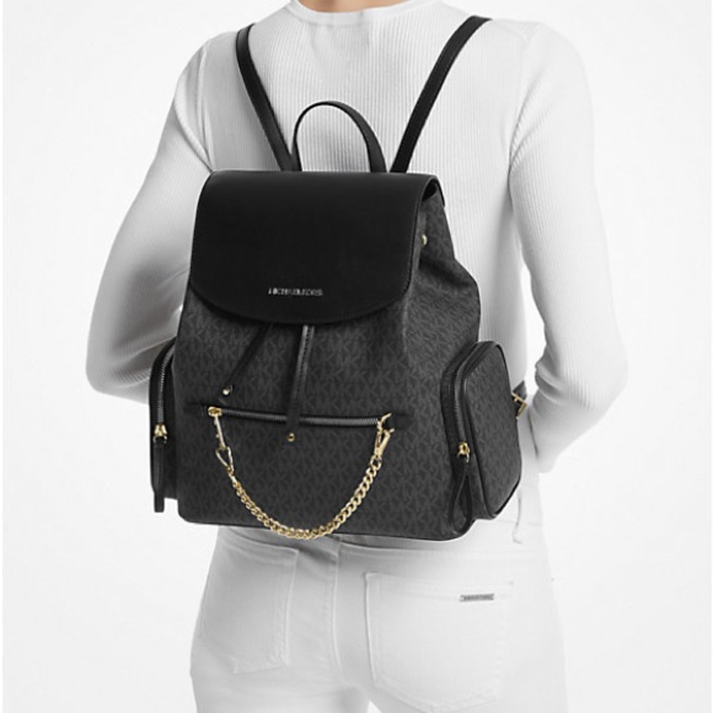 Michael Kors Black Backpack with Gold Accents and Flap Closure